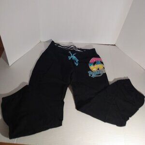 Justice: woman's black cotton lightweight stretch pants. Size 16.